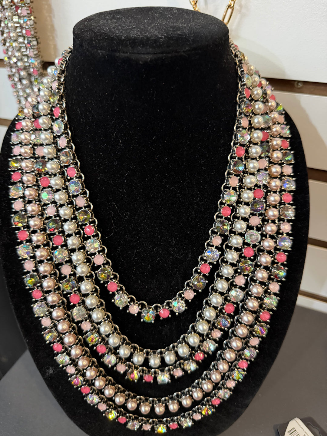 5 layered pink stone,  rhinestone and pearl necklace.  Silver