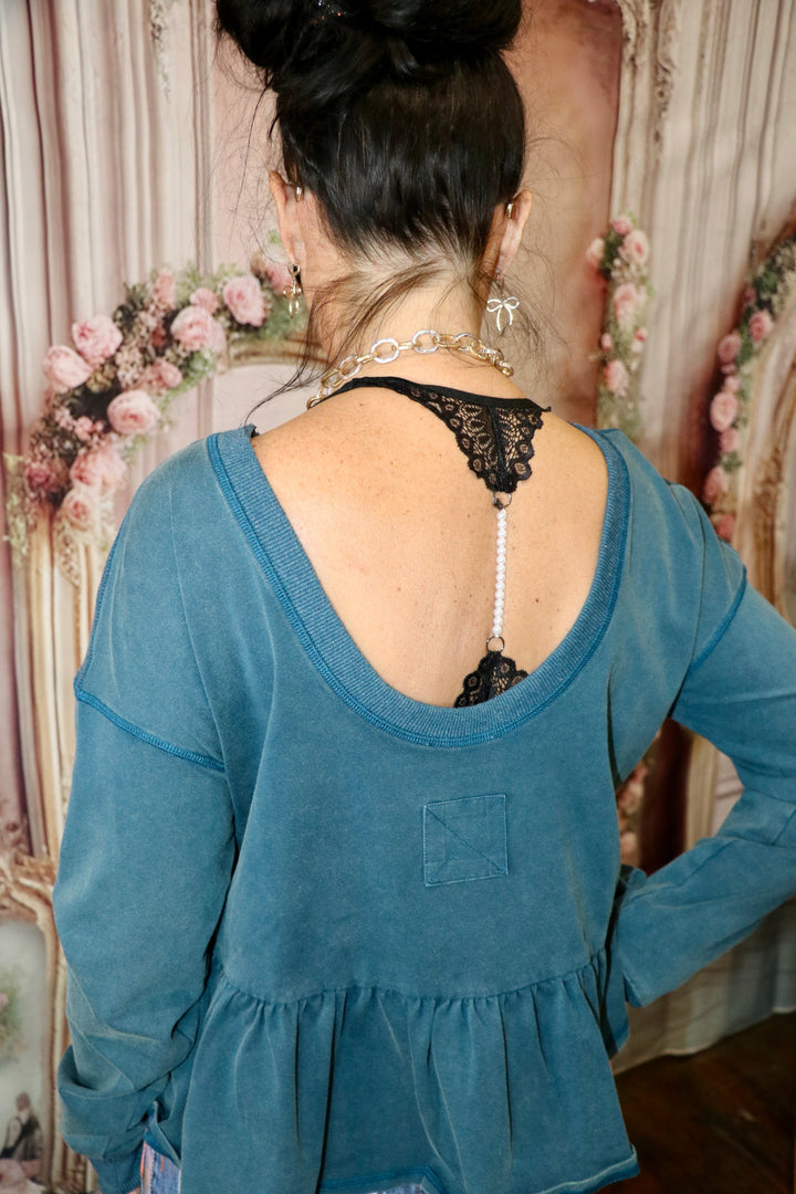 Mineral washed peplum pullover top