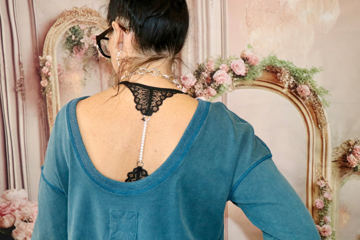 Mineral washed peplum pullover top