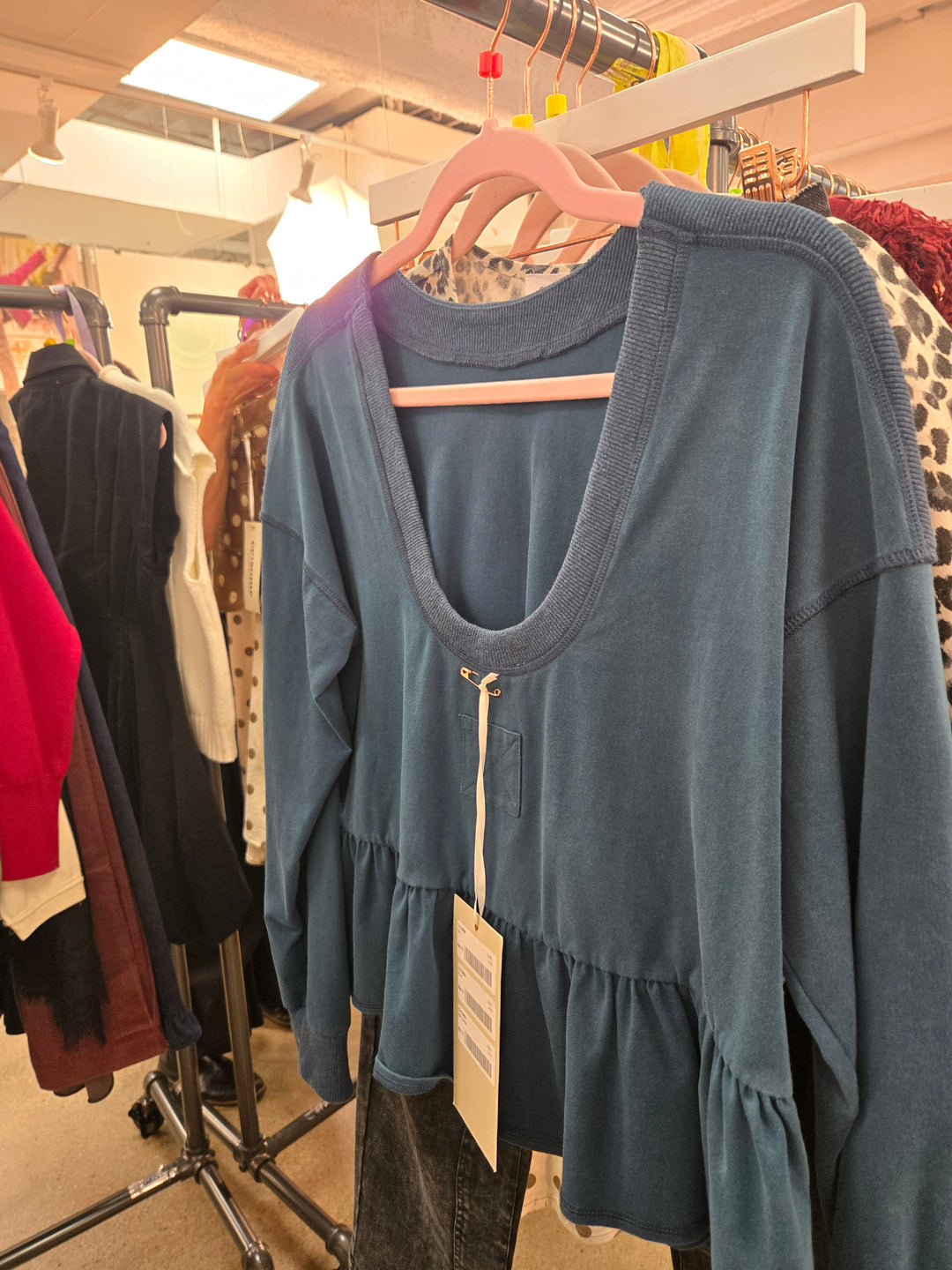 Mineral washed peplum pullover top