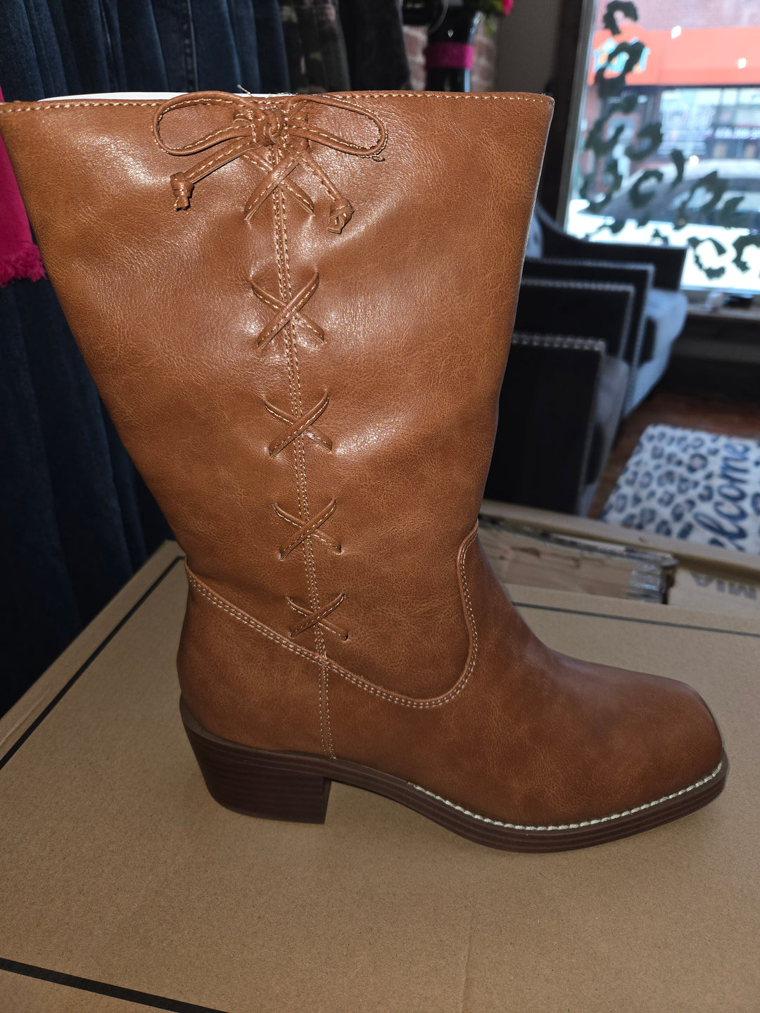 Mid calf dark tan boots side detail ties