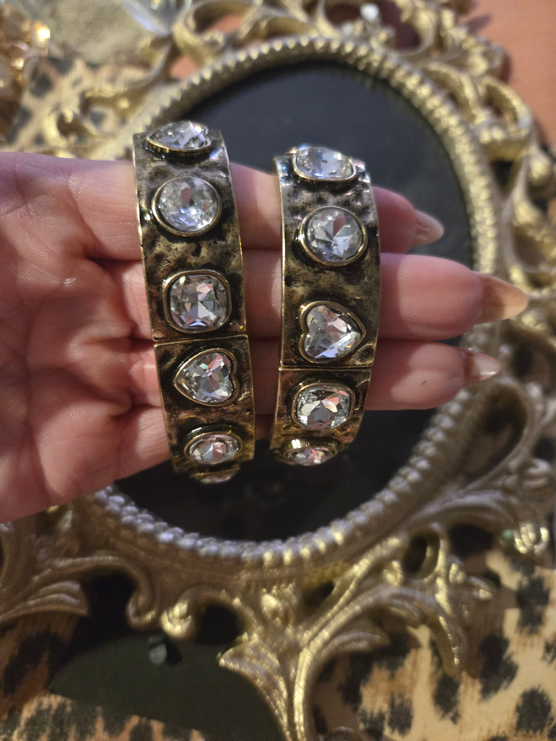 Gold bronze stretch bracelet.  Rhinestone heart
