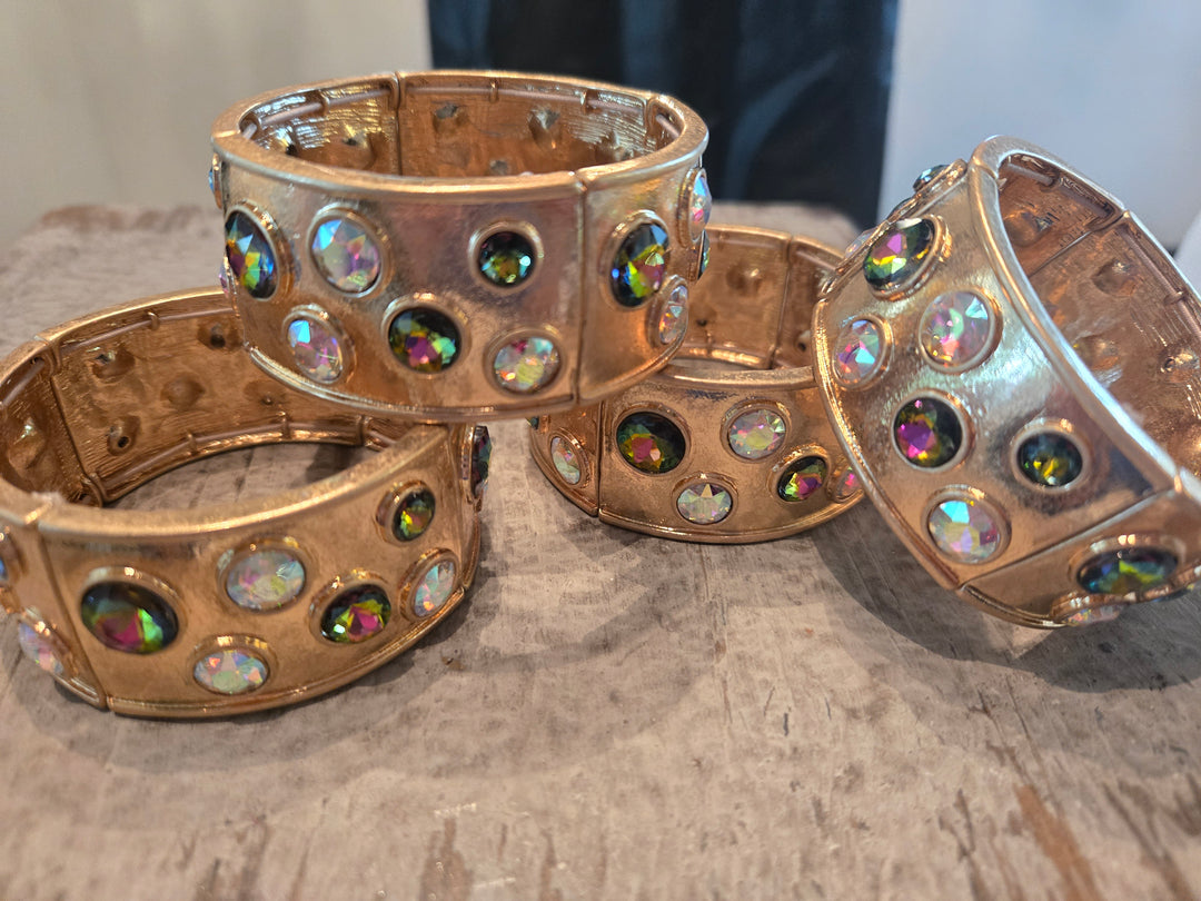 Gold stretch bracelet with rhinestones and multifaceted rhinestones