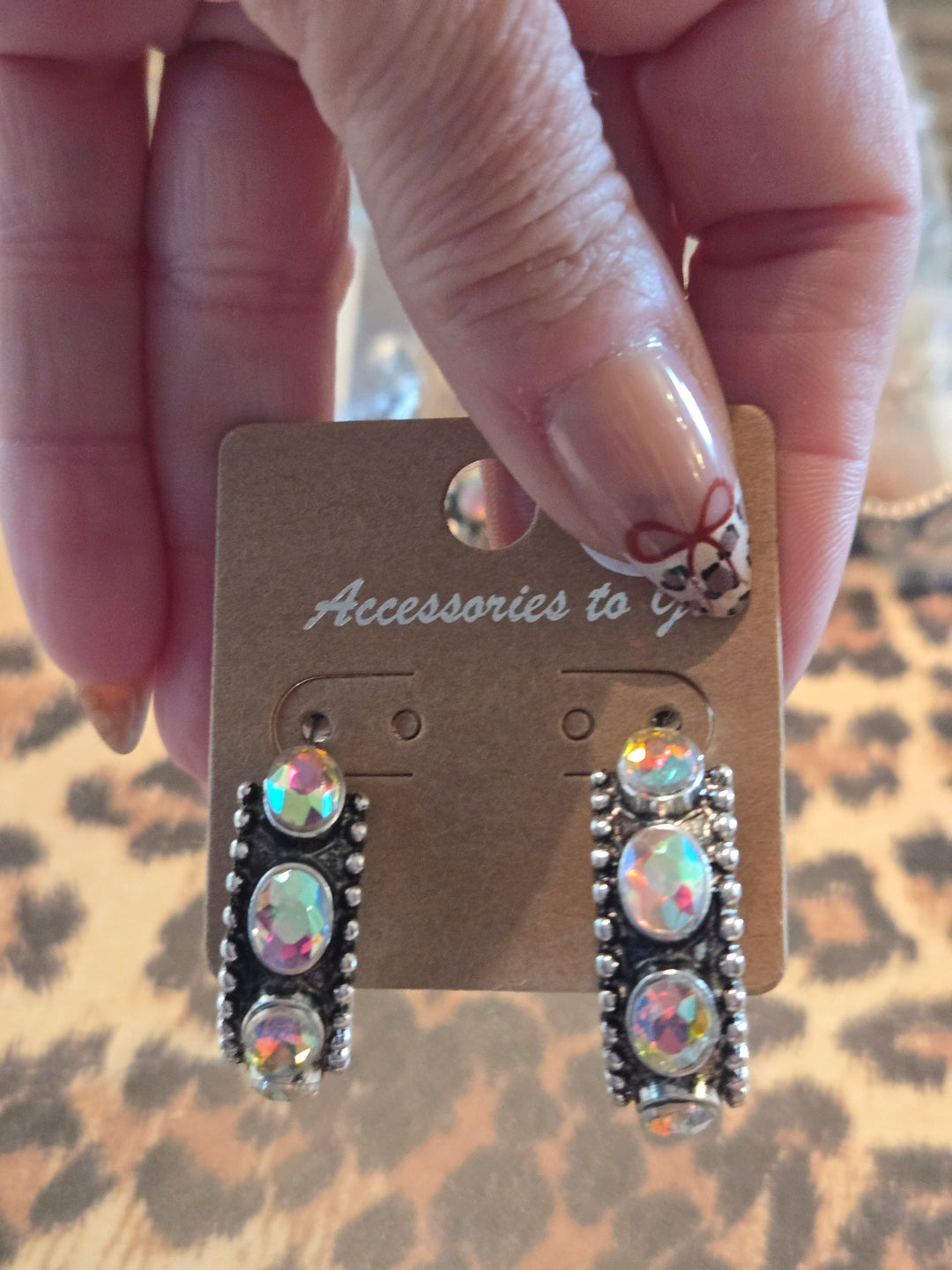 Black hoop earrings with multicolored stones