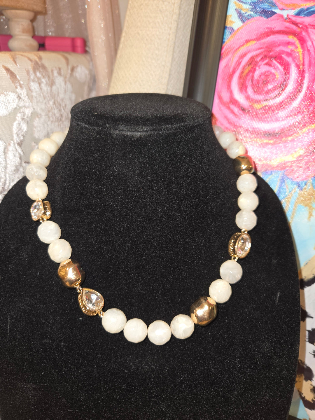 Cream stones and gold with rhinestone accent