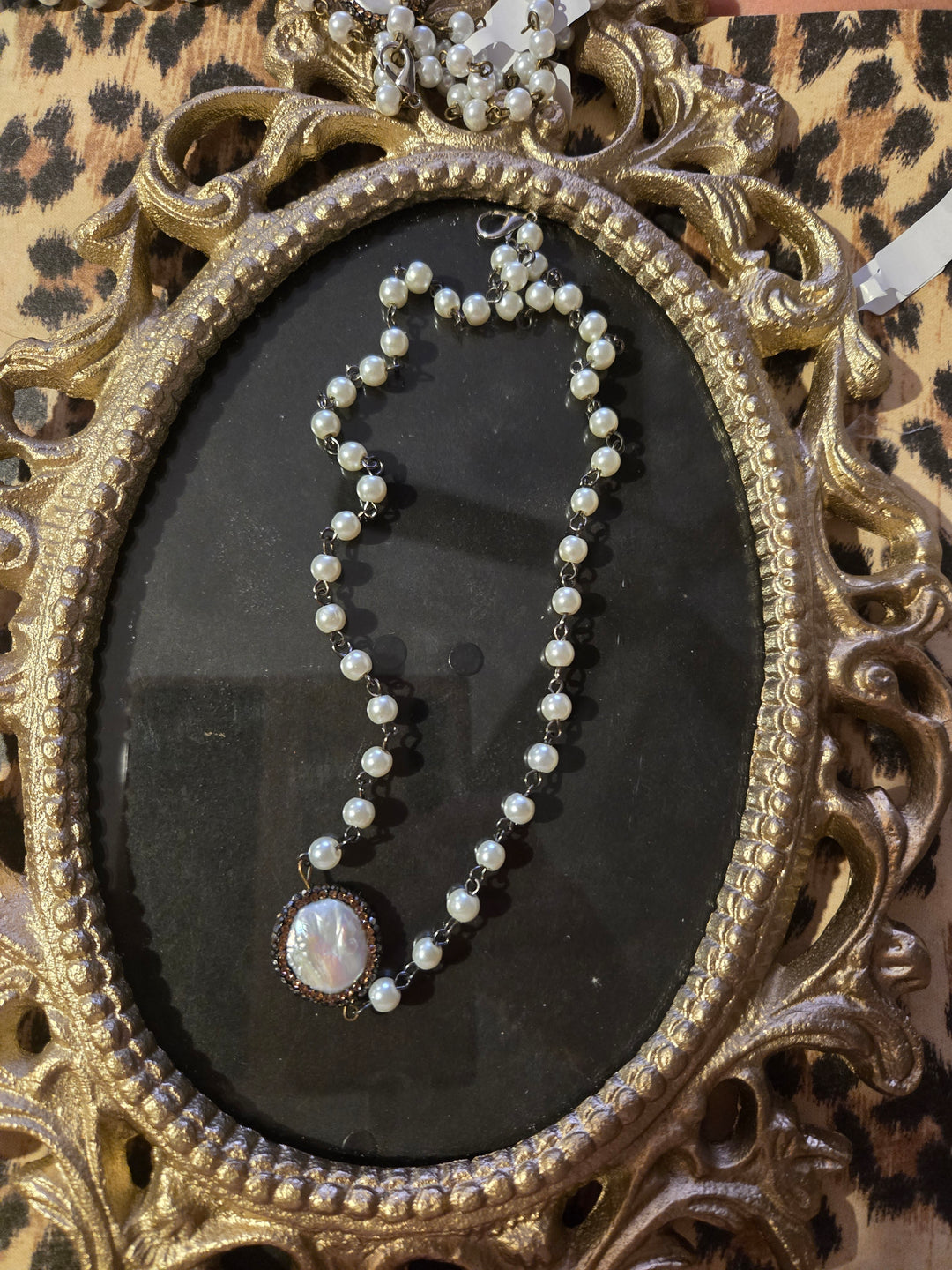 Pearl necklace with pearl charm