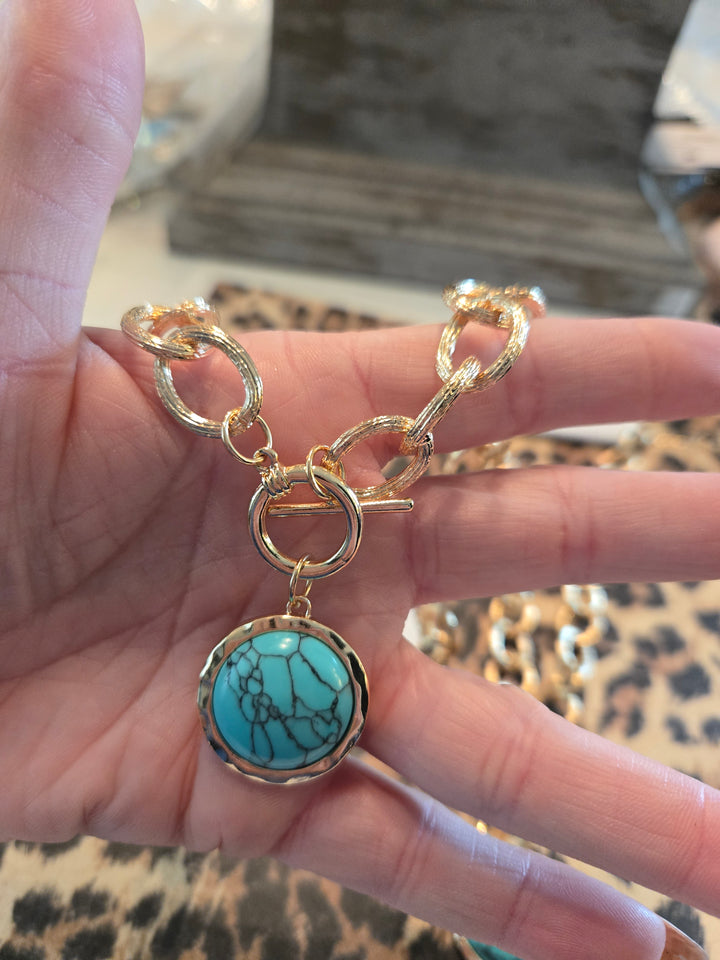 Gold toggle chain with turquoise charm