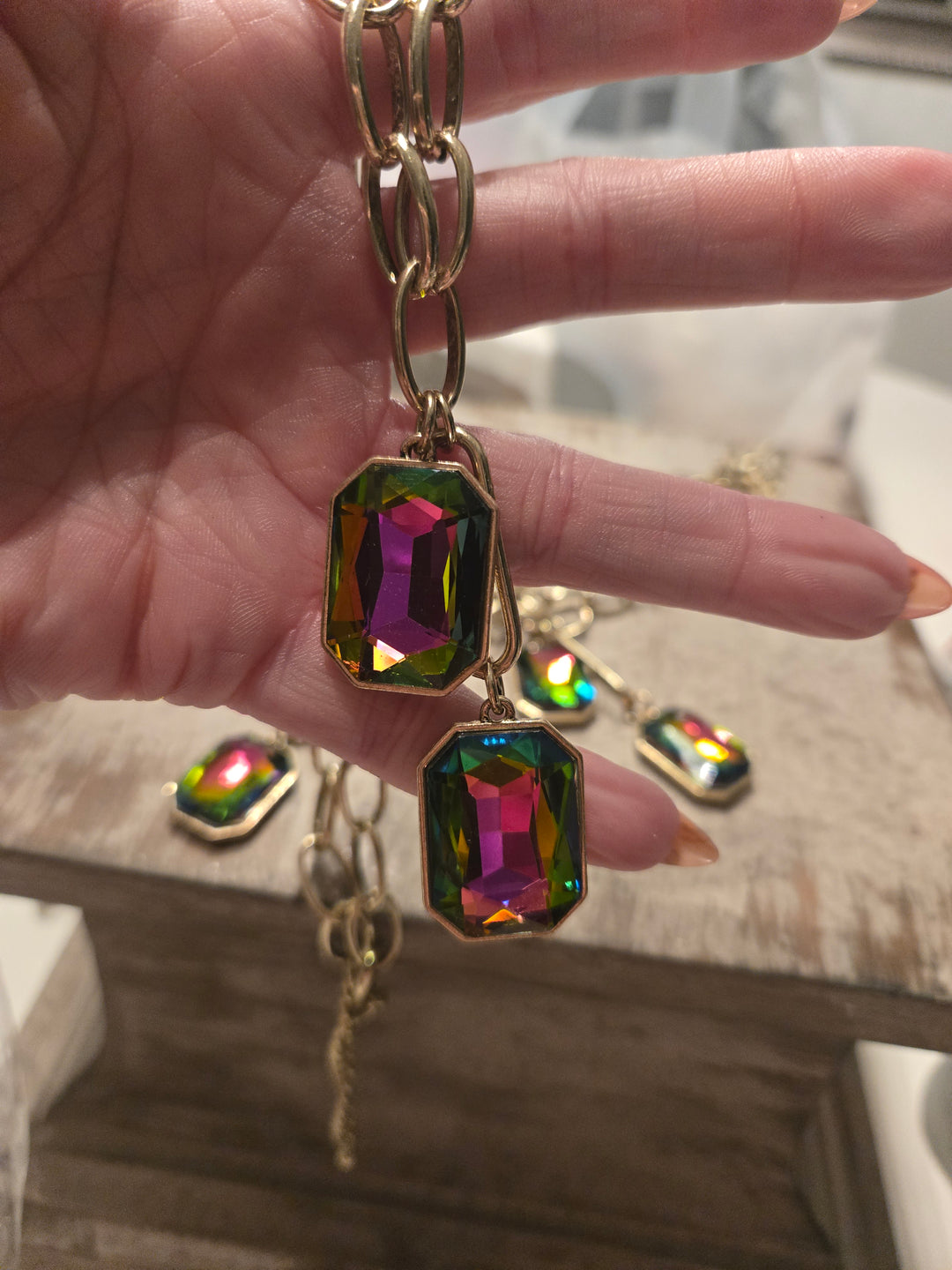 Multi color charms on gold chain