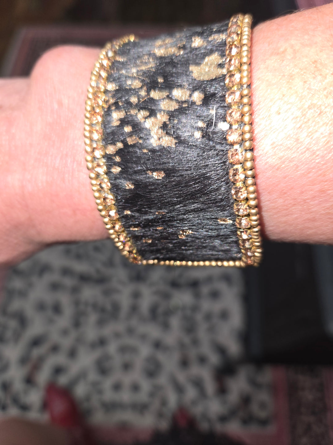Bangle cuff bracelet. Black and gold.