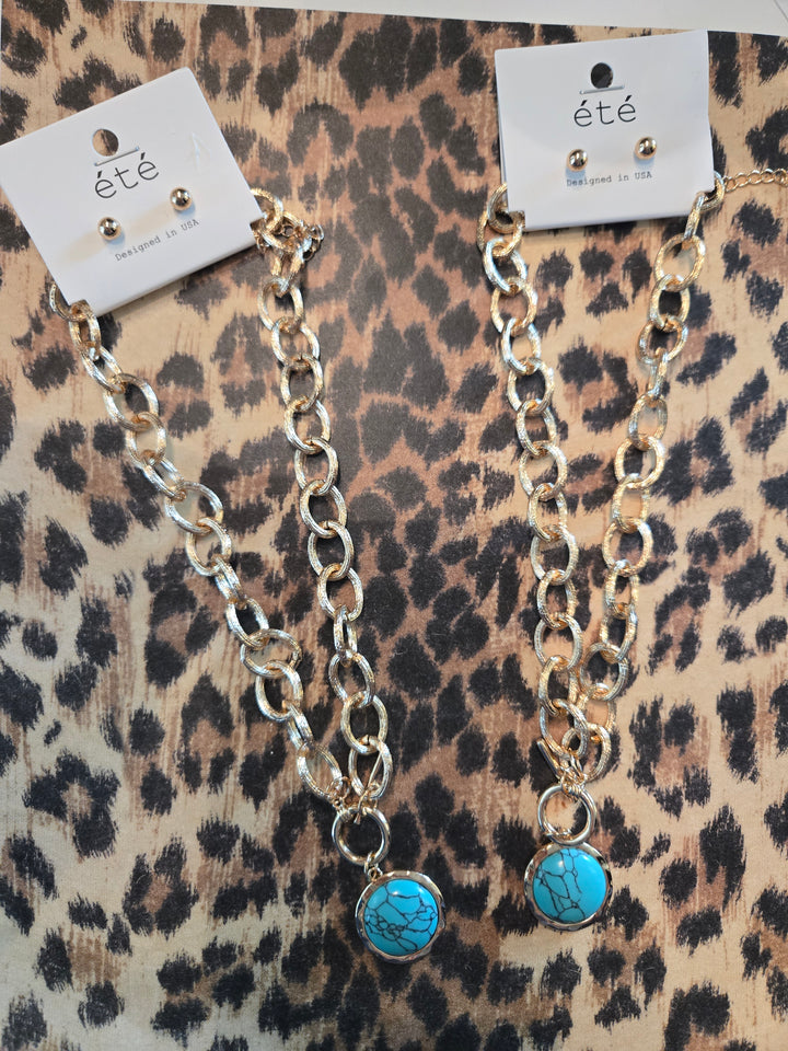 Gold toggle chain with turquoise charm