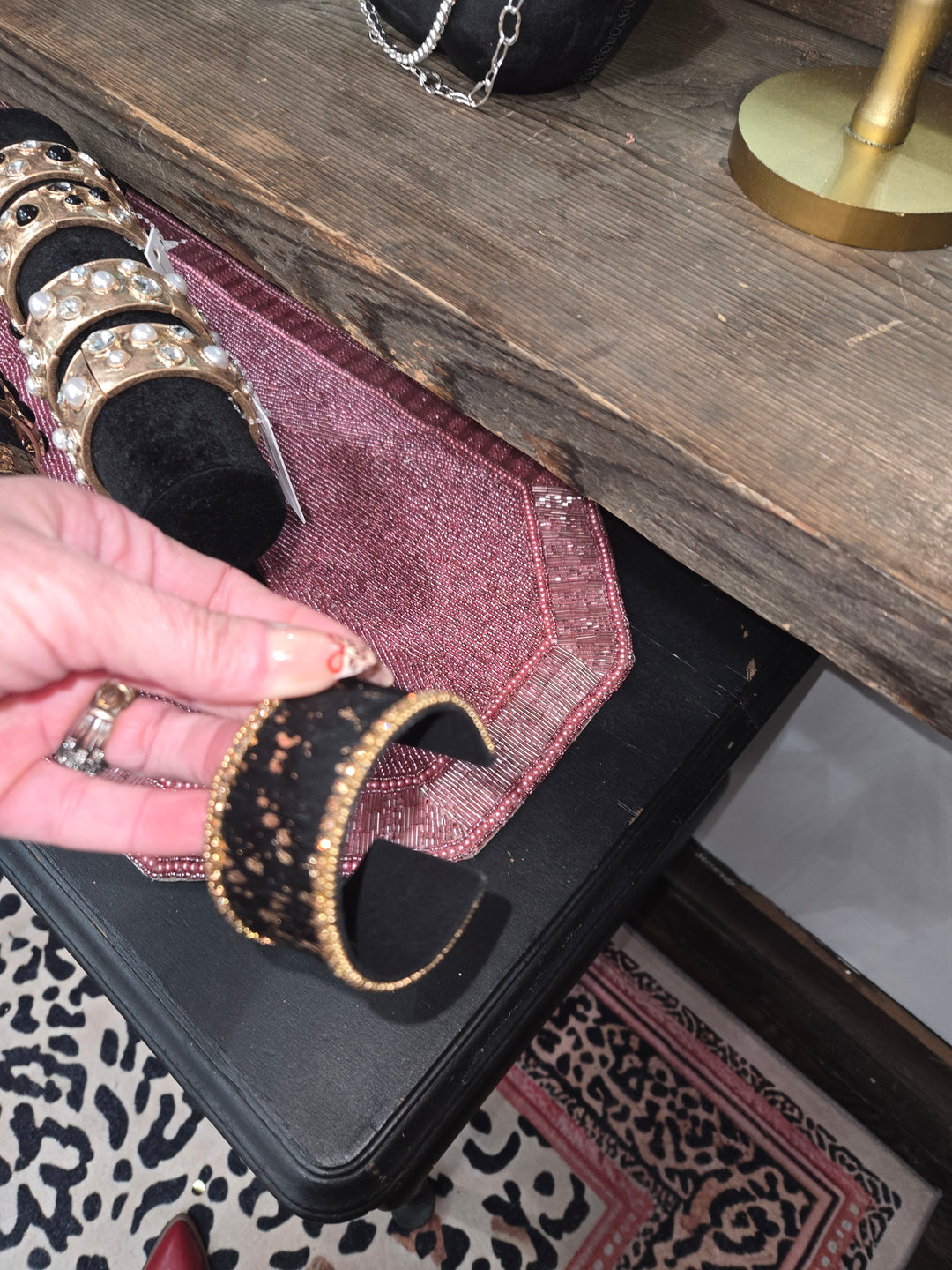Bangle cuff bracelet. Black and gold.